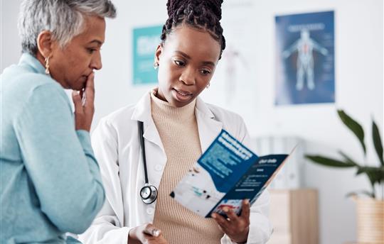 Brochure, consulting or doctor talking to patient for life insurance or healthcare services